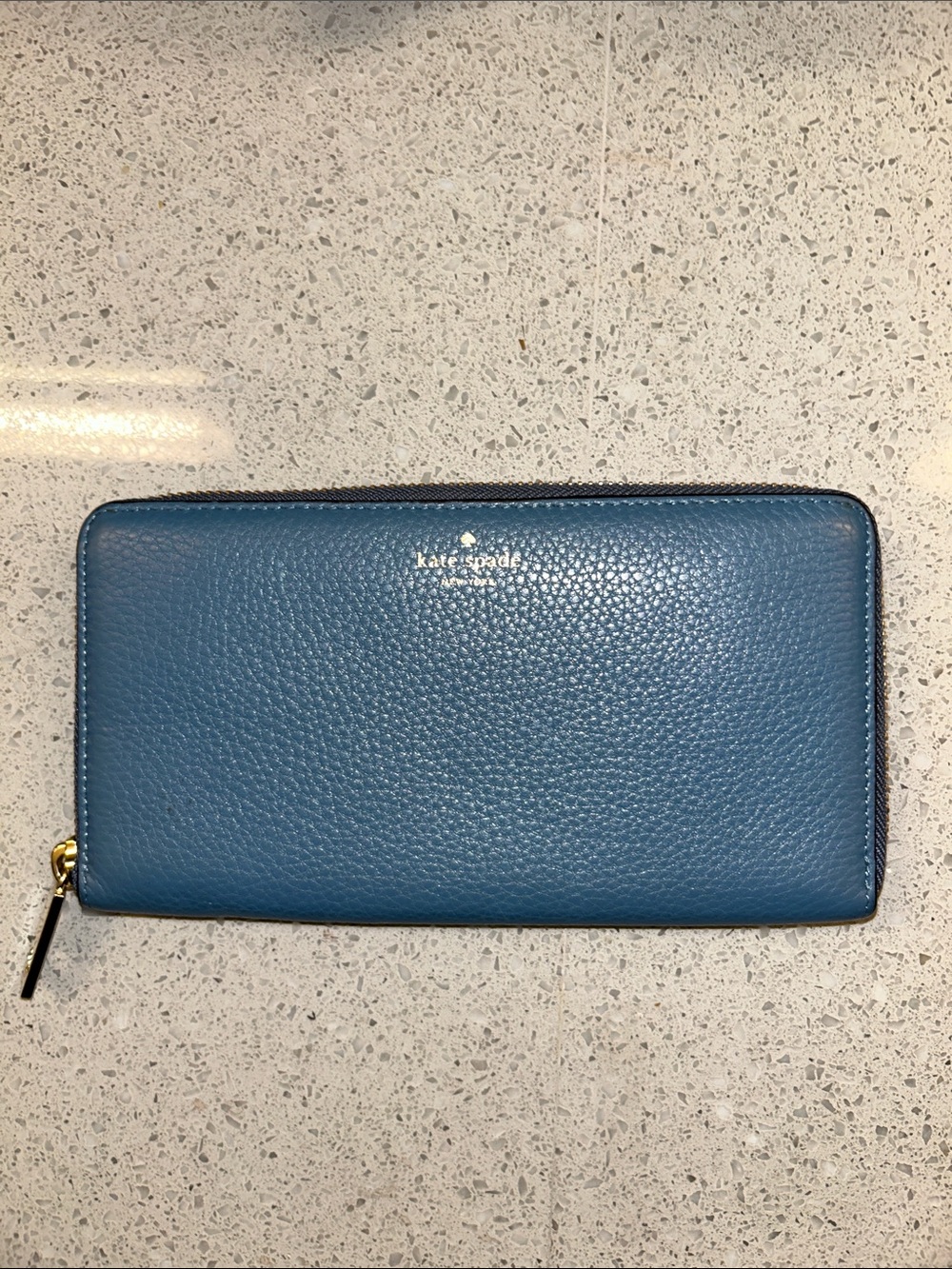 kate spade pebbled leather zip-around wallet in teal blue